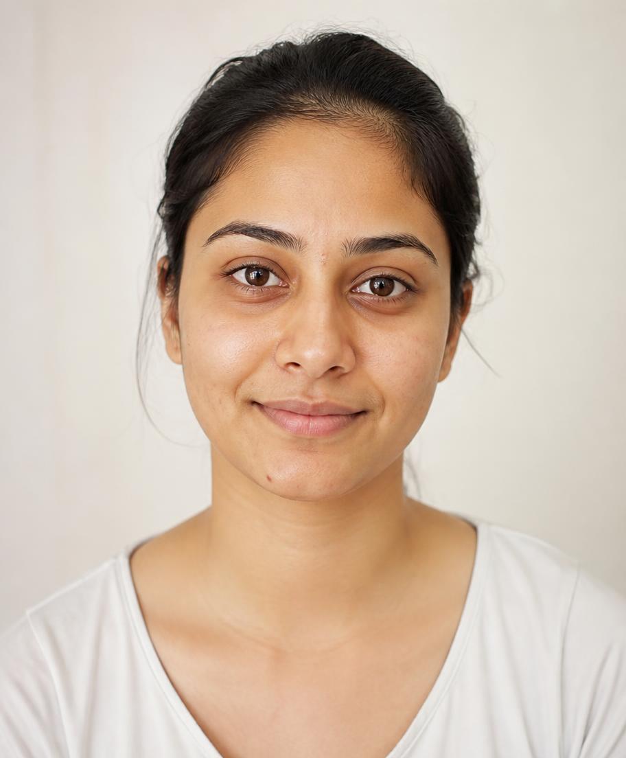 Demo client before her salon appointment, natural skin and tied hair